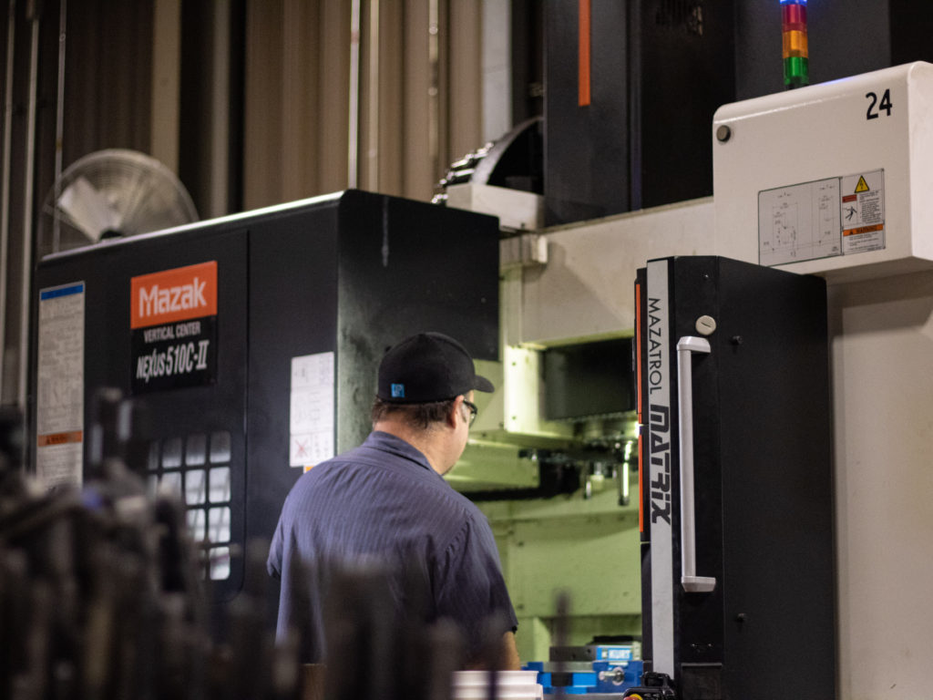 Employee on Mazak Machine